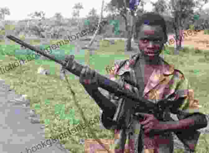 A Young Ishmael Beah, Wielding A Gun As A Child Soldier During The Liberian Civil War. Long Way Gone Charles Martin